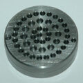 Metal Trap Twin Filter Disc with .031 Opening. Disks Are 1-5/8" OD. Material: 4140 Steel 35-38 Rc